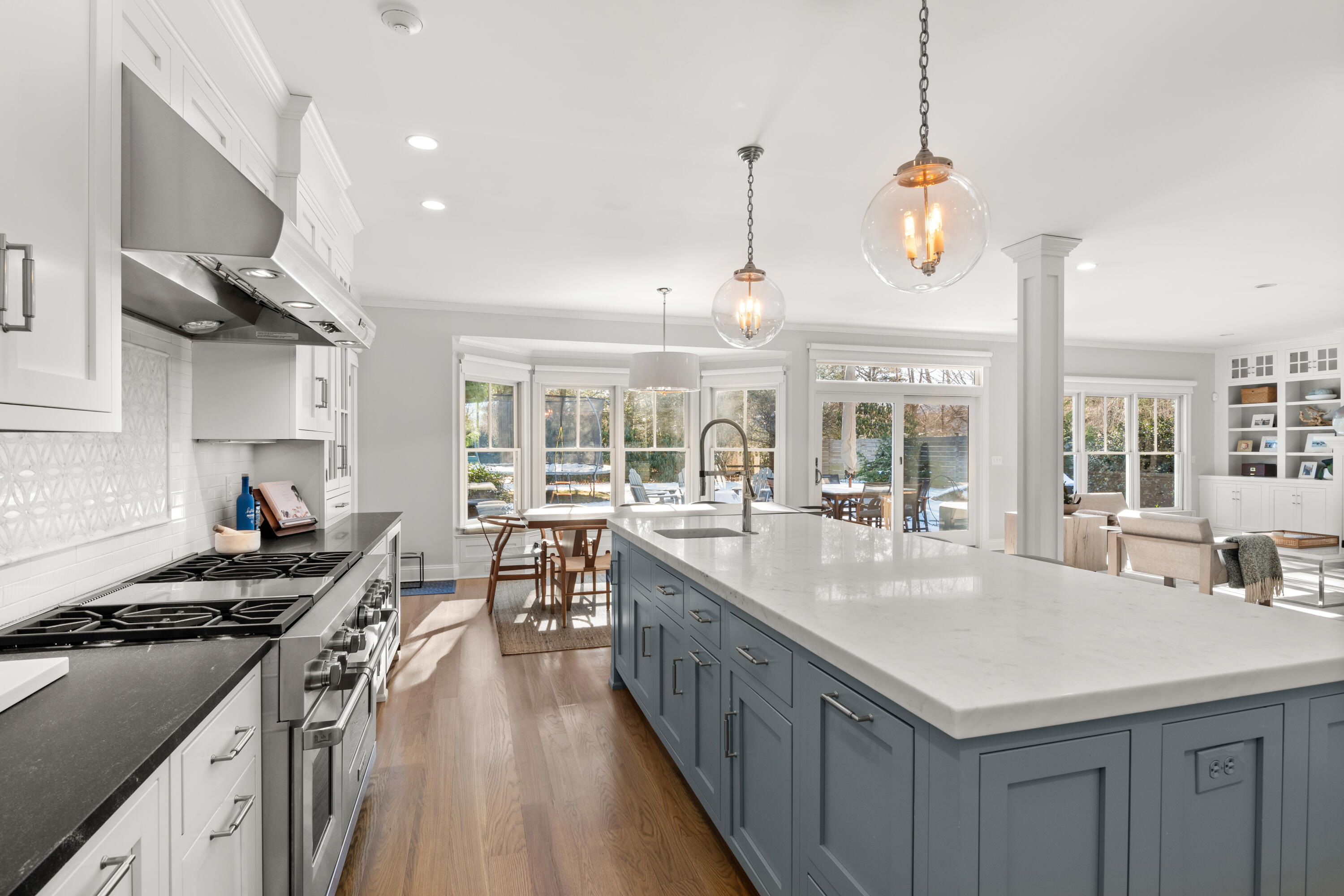 12 1/2 Ridgewood Road Rowayton, CT 06853 - Photo 7 of 25 a kitchen with stainless steel appliances granite countertop a stove and a sink