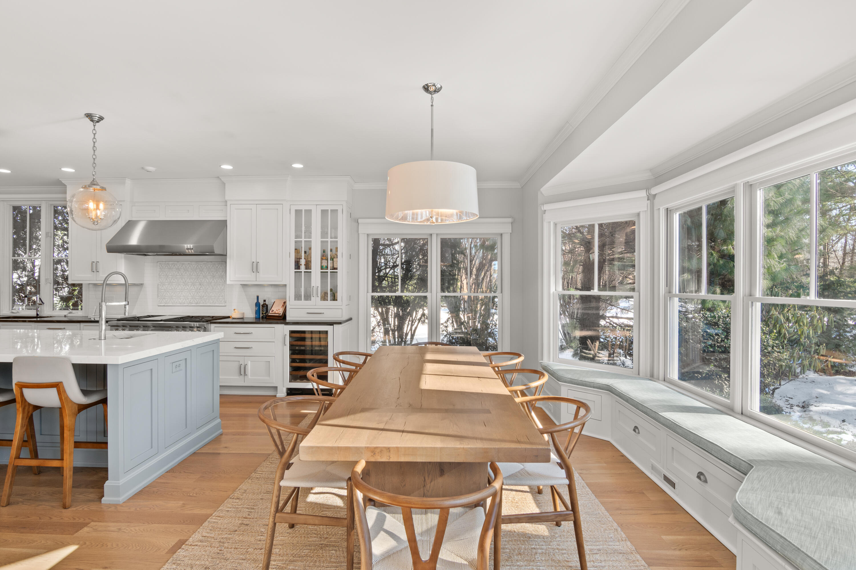12 1/2 Ridgewood Road Rowayton, CT 06853 - Photo 8 of 25 a large kitchen with kitchen island a large window in it