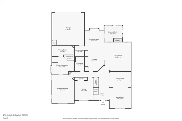 a couple of cars parked on street side of building