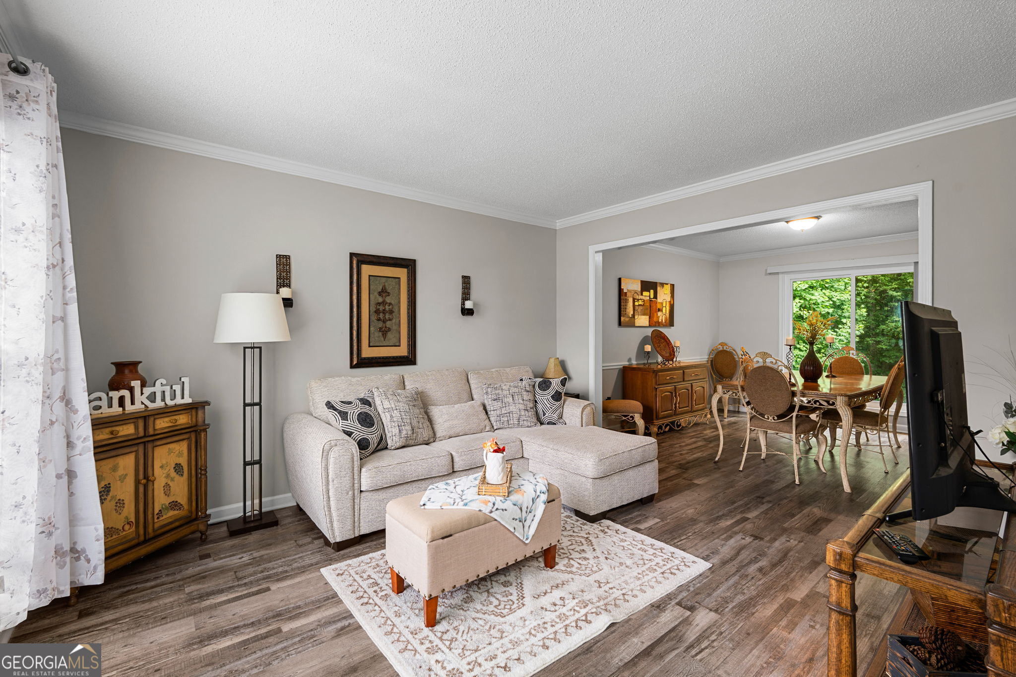 375 Gaelic Way Tyrone, GA 30290 - Photo 6 of 54 a living room with furniture and a fireplace