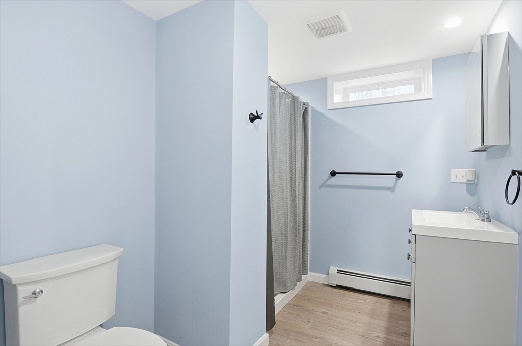 7 Columbine Road Worcester, MA 01609 - Photo 21 of 32 a bathroom with a toilet and a sink