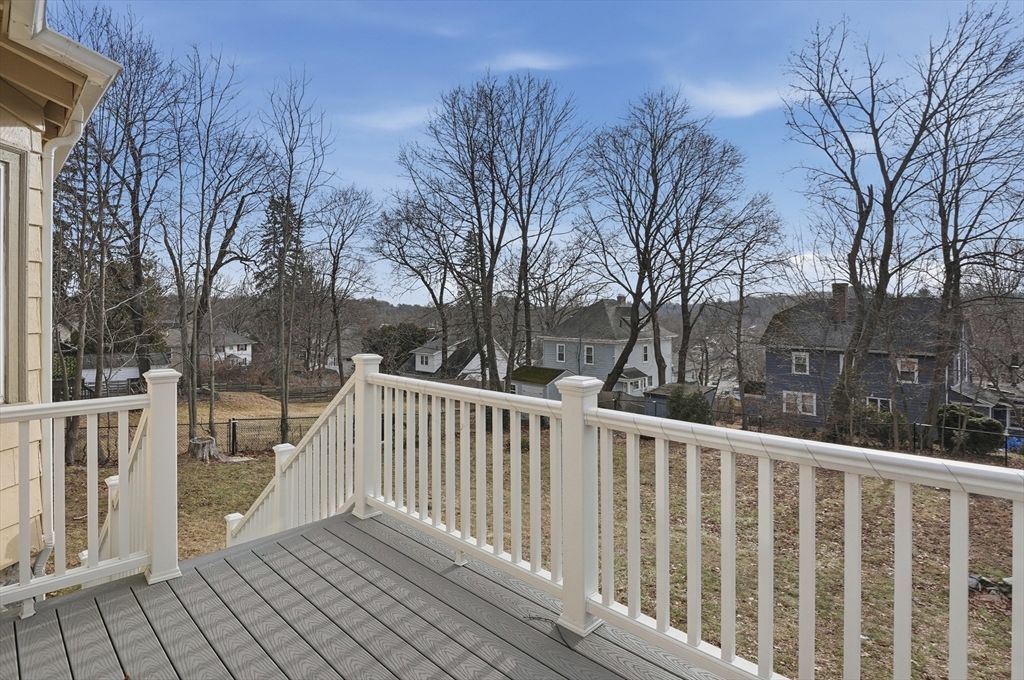 7 Columbine Road Worcester, MA 01609 - Photo 26 of 32 a view of backyard with wooden fence and large trees