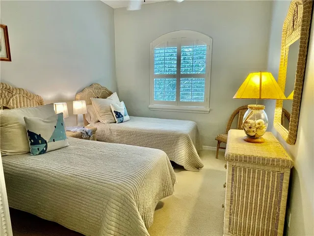 an aerial view of a residential houses with outdoor space