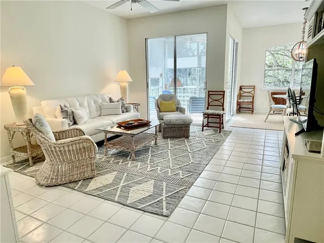 a view of a chair and table in the balcony