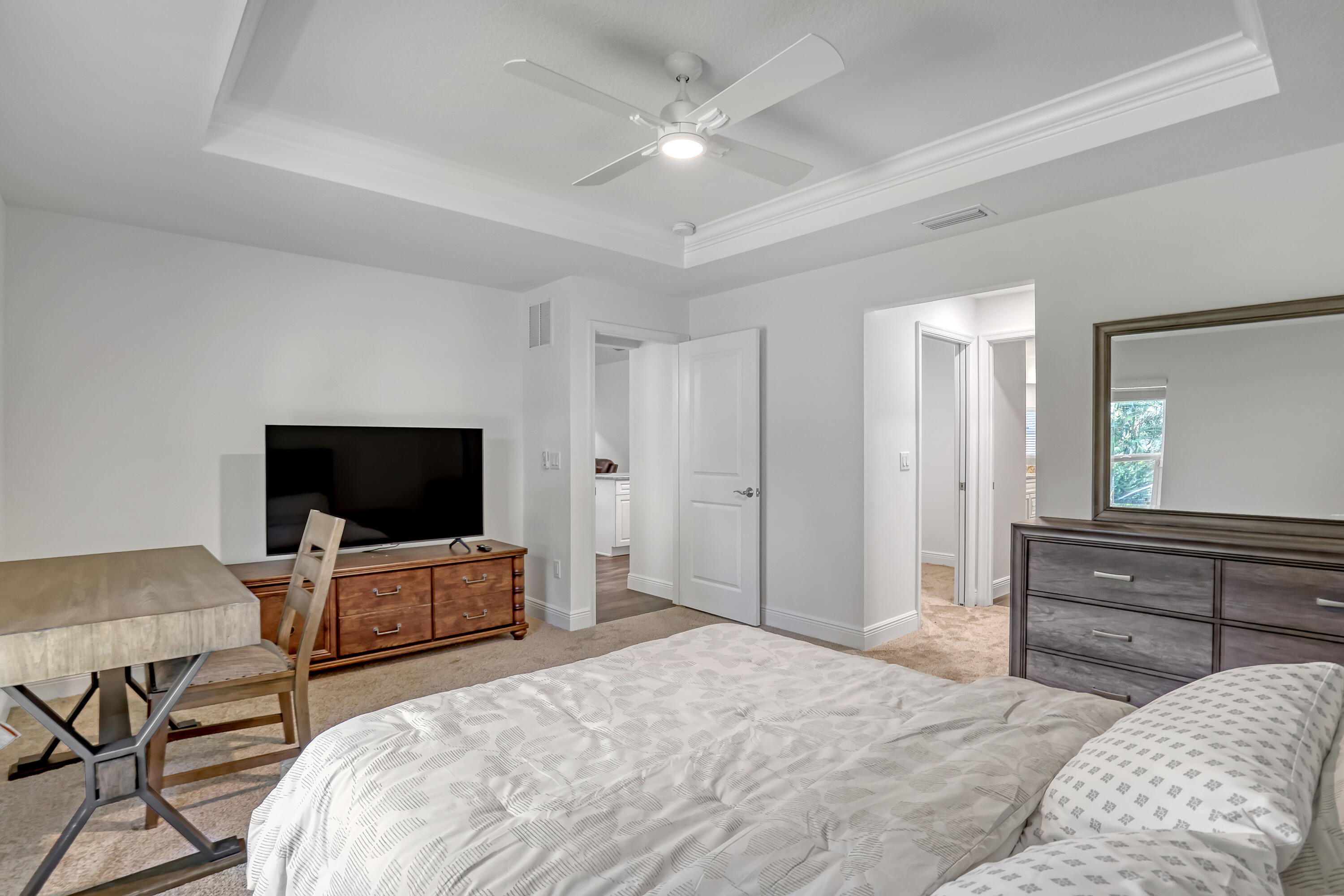 16775 Orange Boulevard Loxahatchee, FL 33470 - Photo 20 of 53 a bedroom with furniture and a flat screen tv