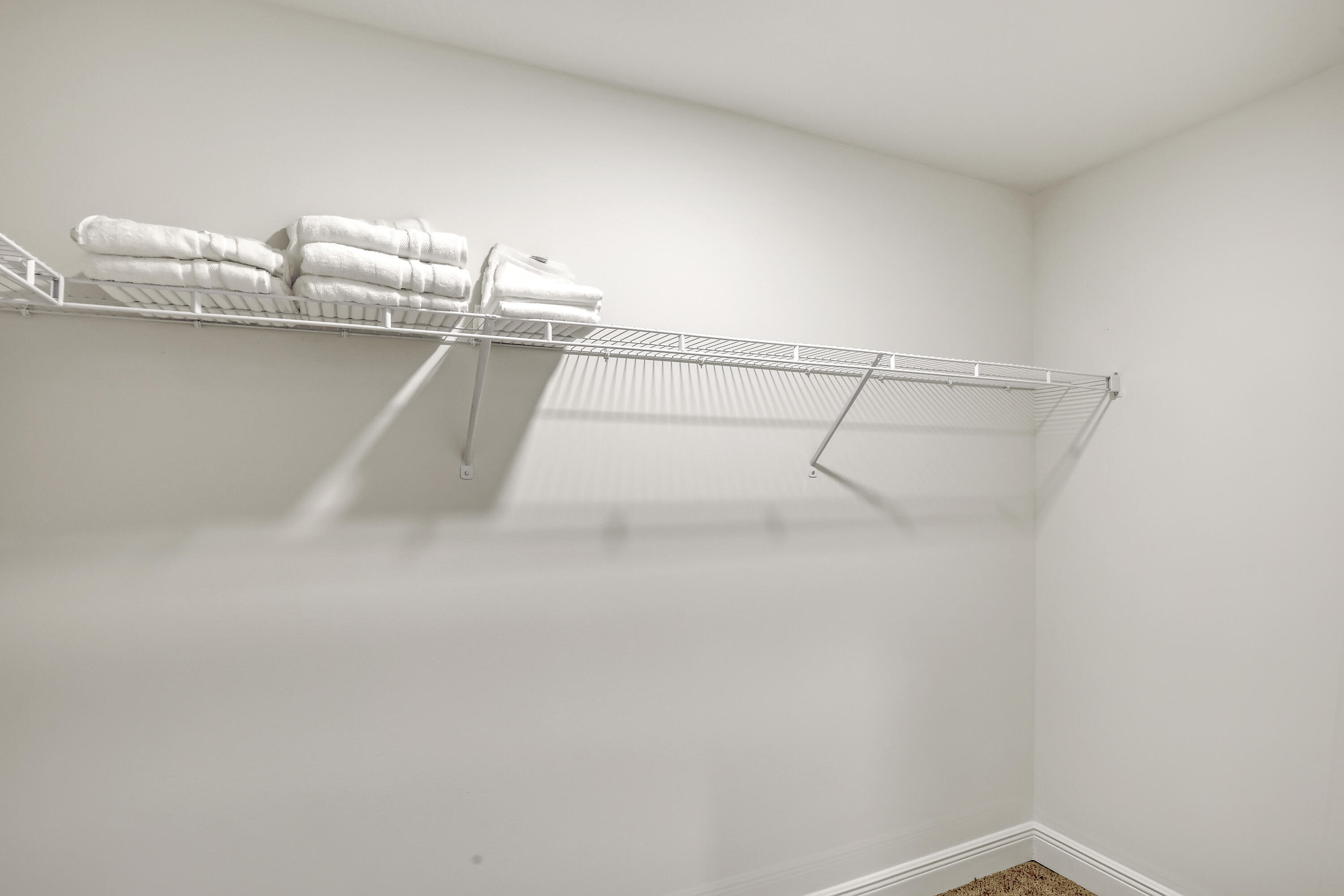 16775 Orange Boulevard Loxahatchee, FL 33470 - Photo 27 of 53 a view of a room with racks on the wall