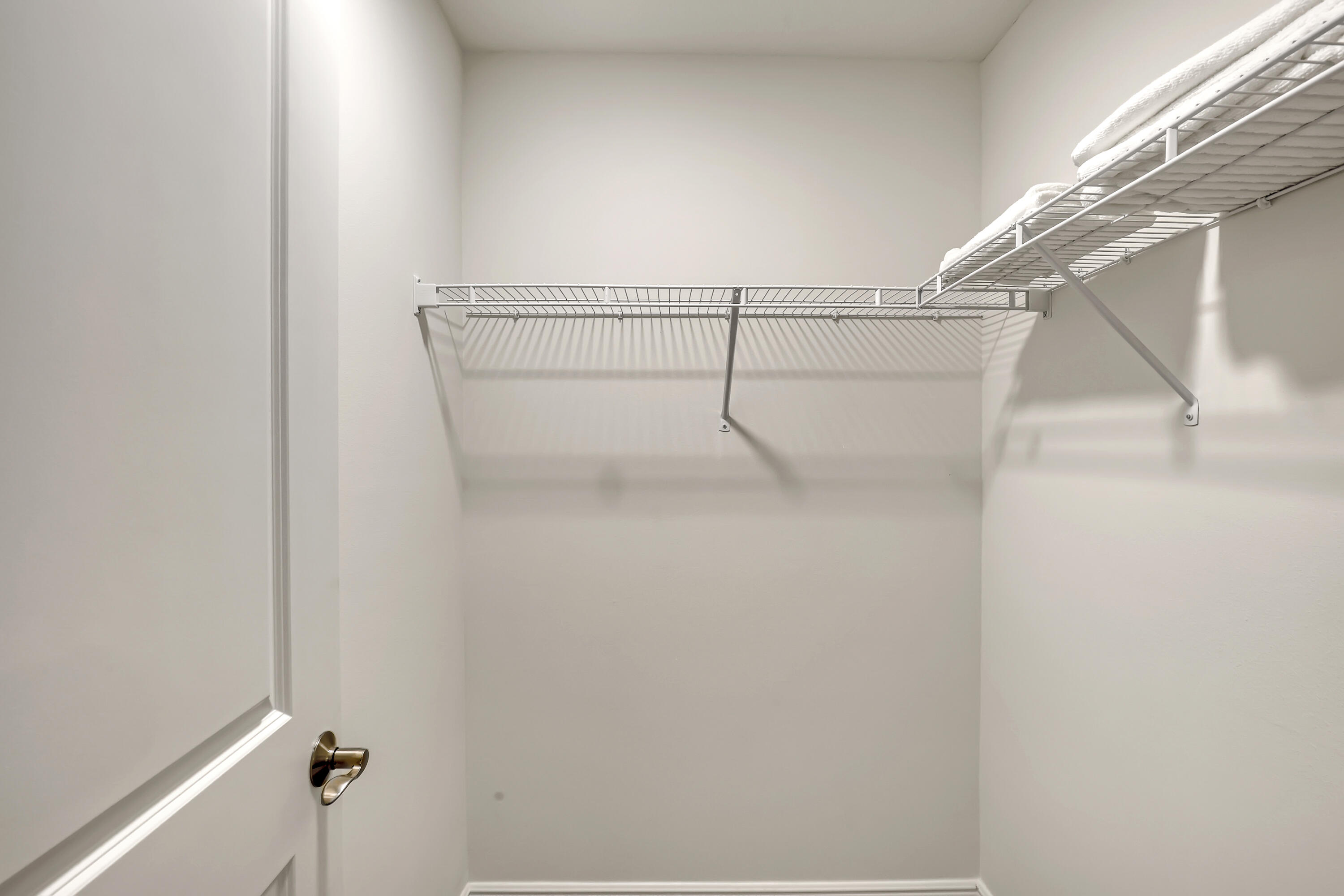 16775 Orange Boulevard Loxahatchee, FL 33470 - Photo 35 of 53 a view of a room with racks on the wall