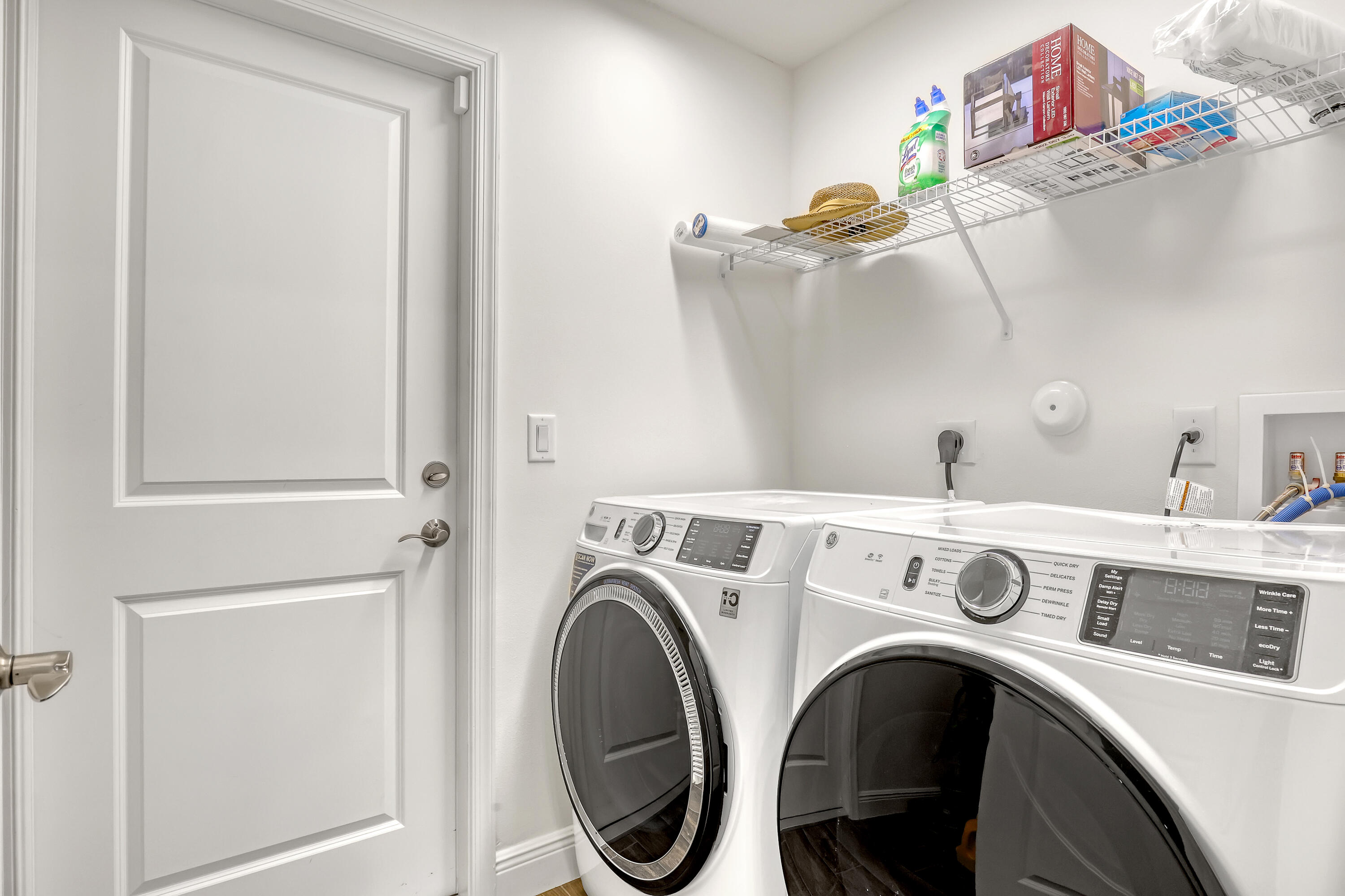 16775 Orange Boulevard Loxahatchee, FL 33470 - Photo 37 of 53 a utility room with dryer and washer