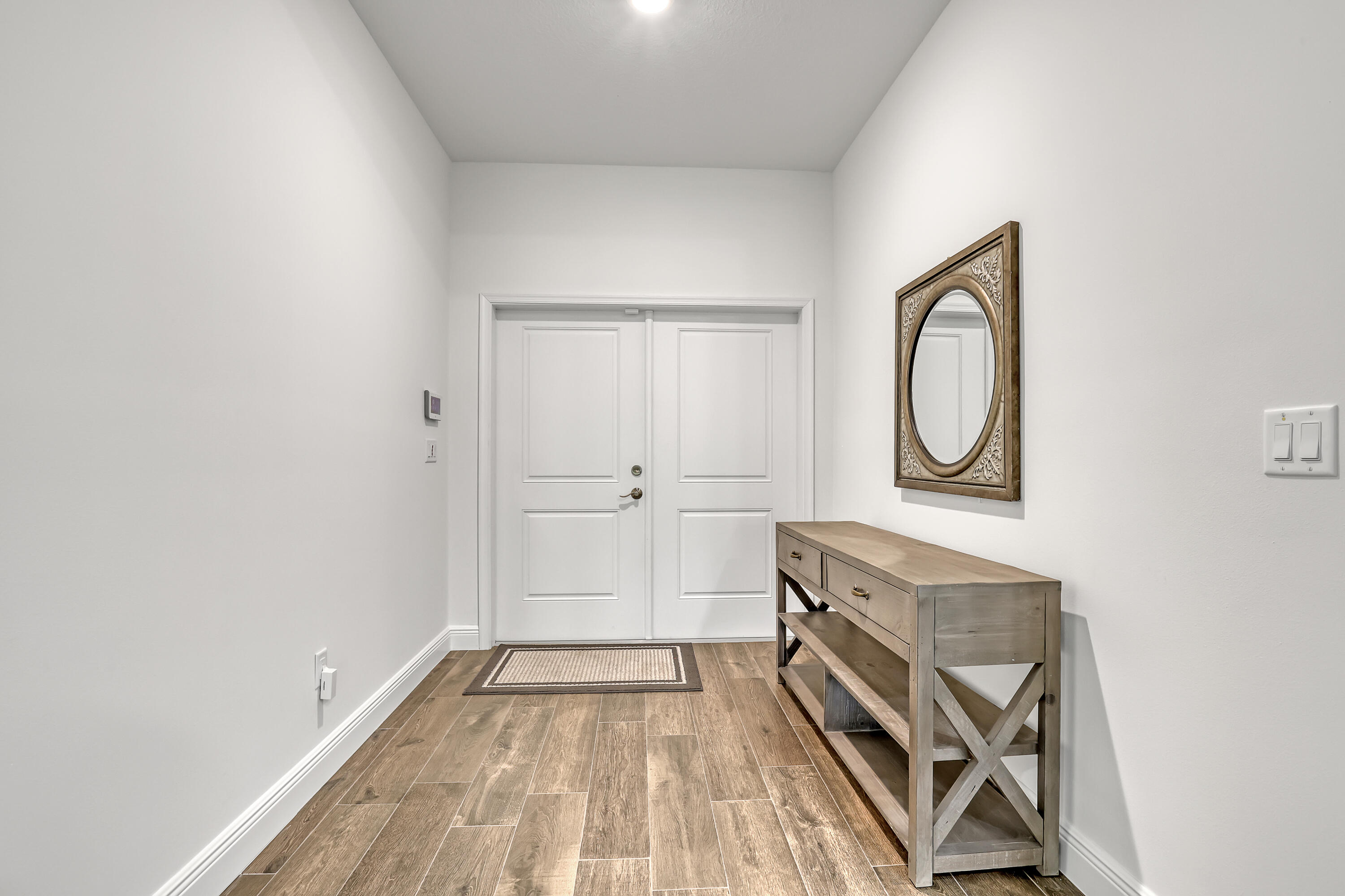 16775 Orange Boulevard Loxahatchee, FL 33470 - Photo 5 of 53 a view of a storage and utility room with washer and dryer