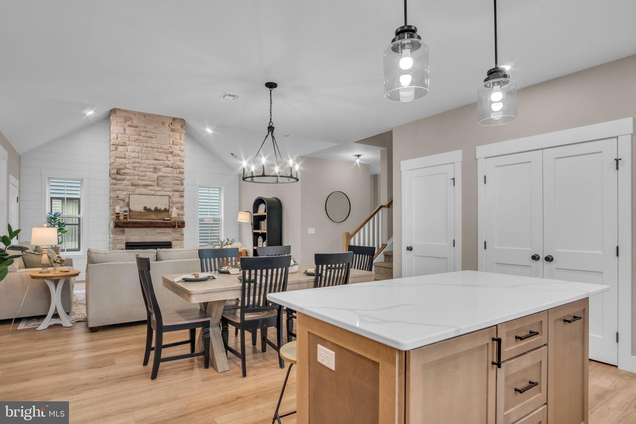 4120 Locust Road Camp Hill, PA 17011 - Photo 21 of 38 a kitchen with a table chairs and white cabinets