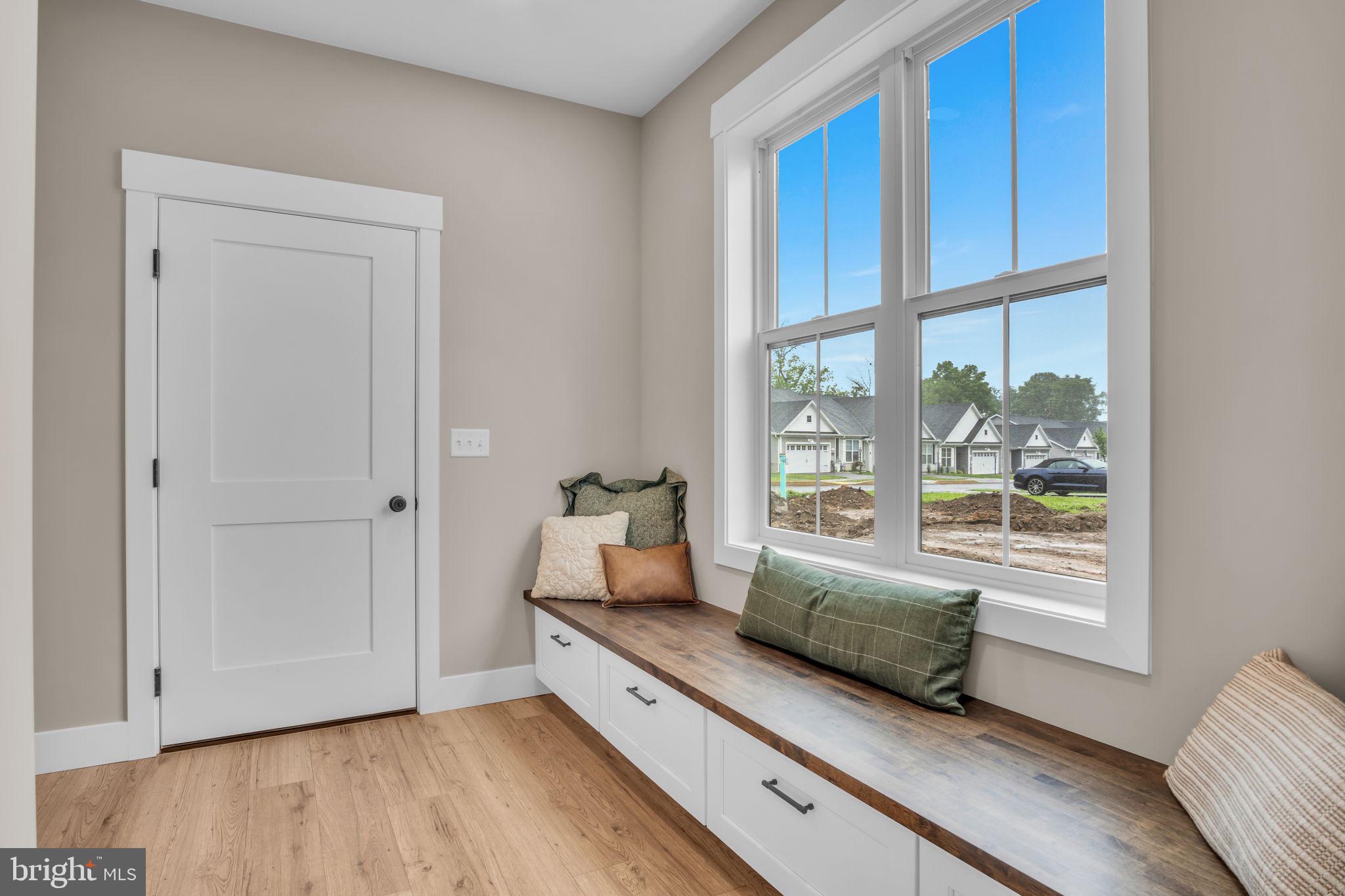 4120 Locust Road Camp Hill, PA 17011 - Photo 24 of 38 a room with a bed and a large window with wooden floor