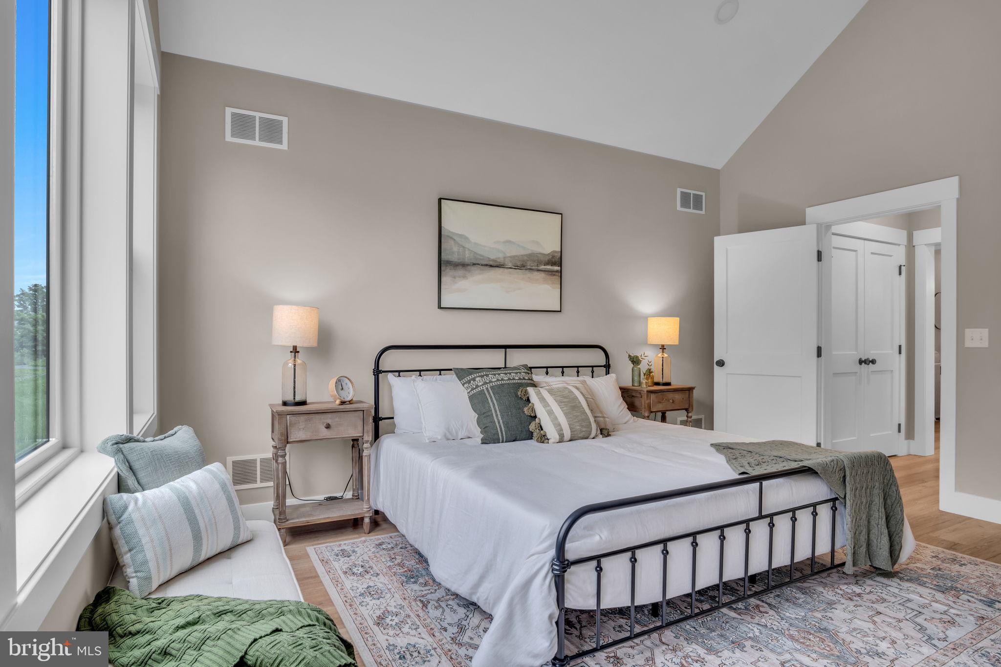 4120 Locust Road Camp Hill, PA 17011 - Photo 29 of 38 a spacious bedroom with a bed and a couch