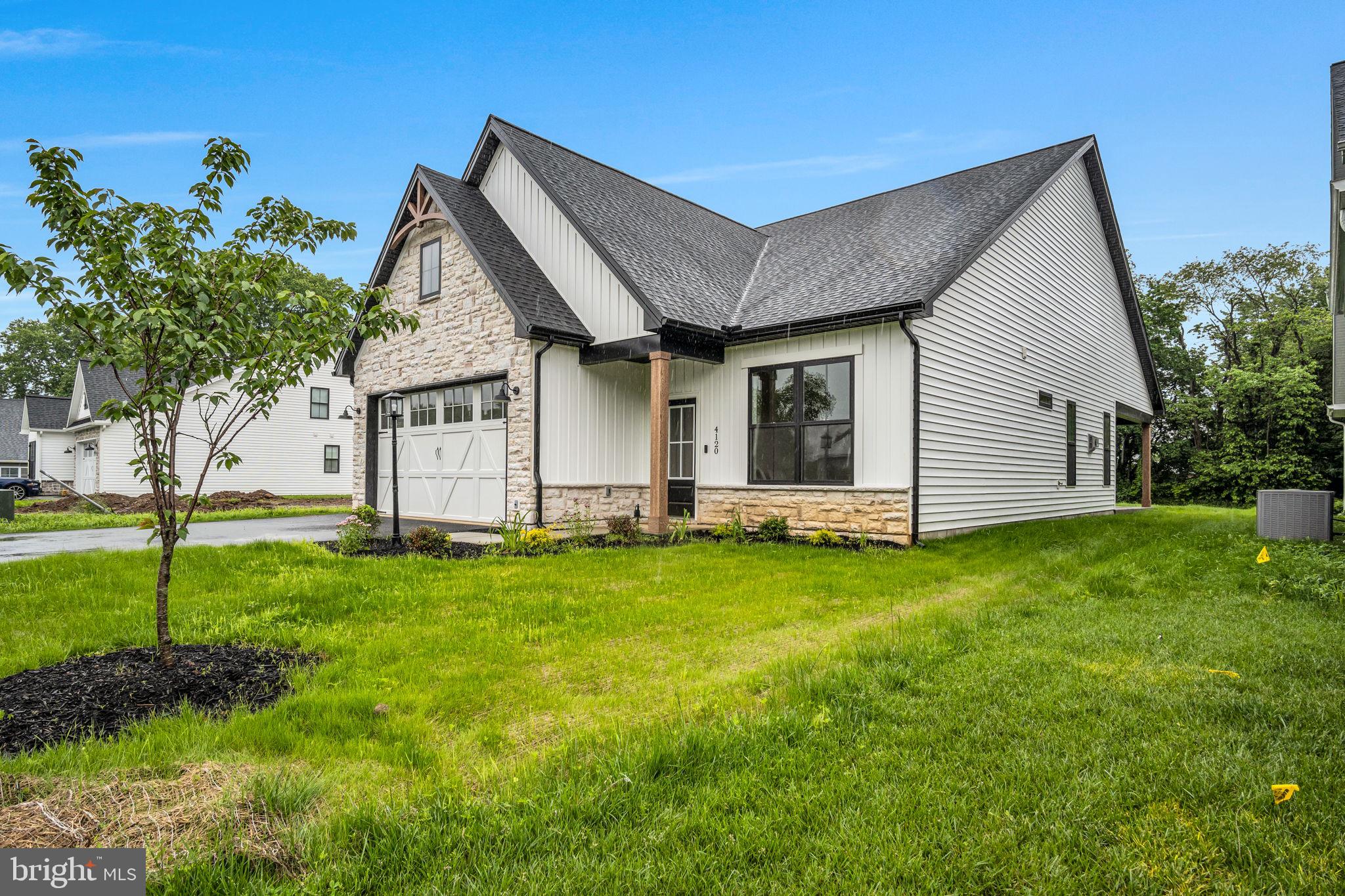 4120 Locust Road Camp Hill, PA 17011 - Photo 3 of 38 a view of a house with backyard and garden