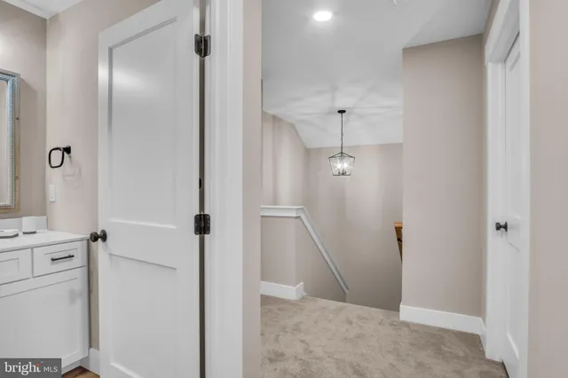 a view of a hallway with closet