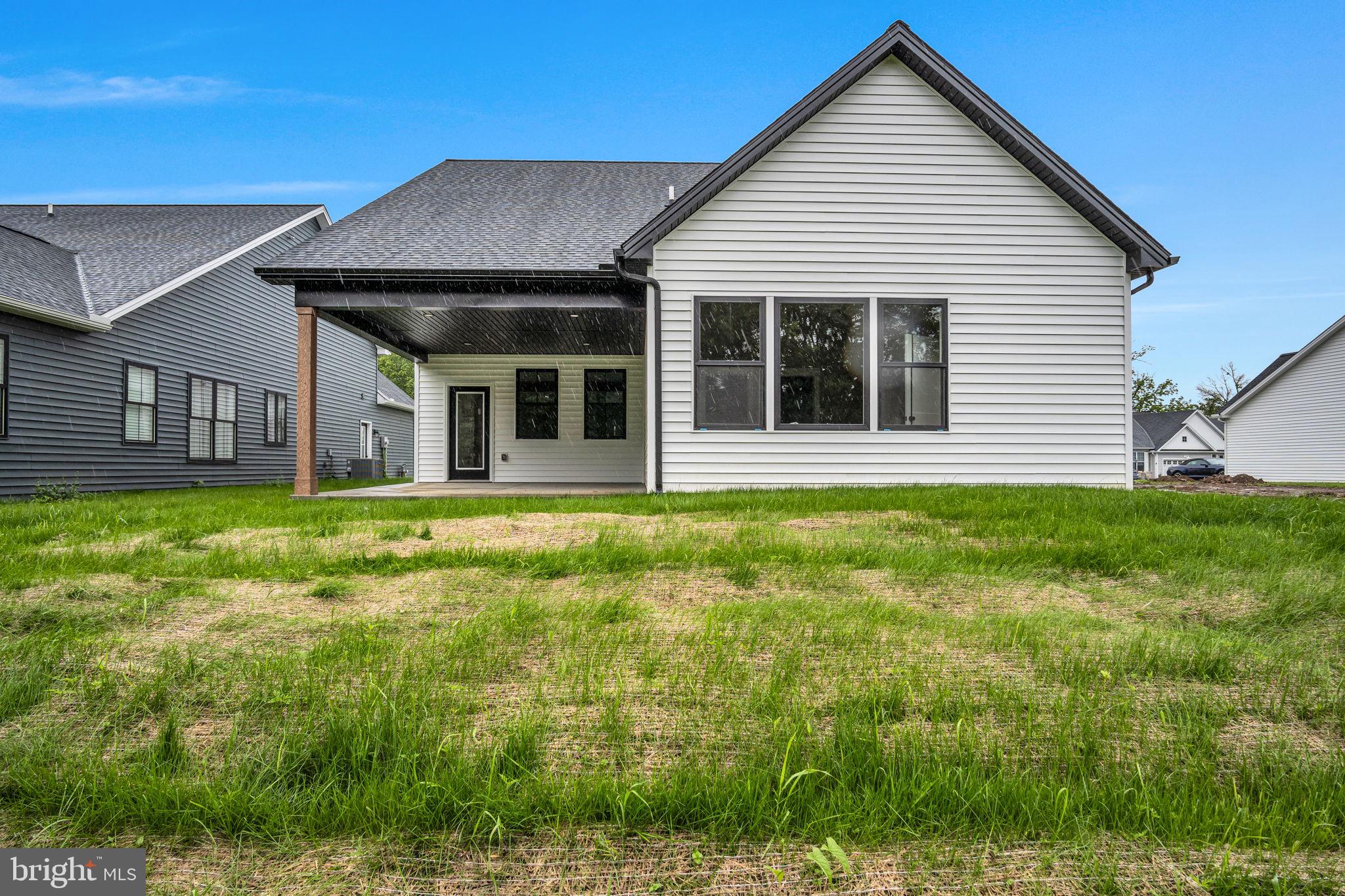 4120 Locust Road Camp Hill, PA 17011 - Photo 5 of 38 a front view of a house with garden