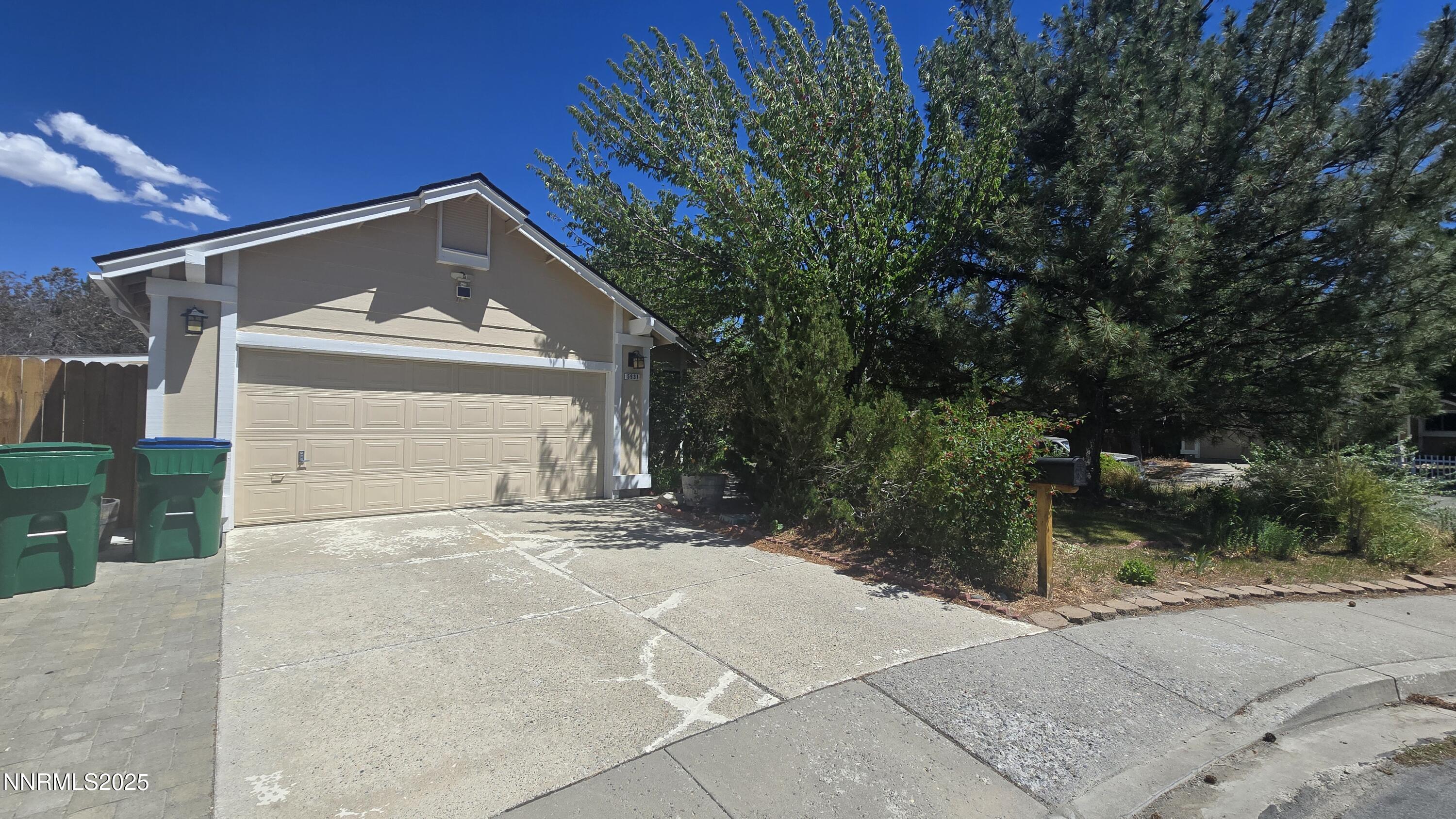 5931 Coyote Ridge Court Reno, NV 89523 - Photo 1 of 1 a view of a house with a yard