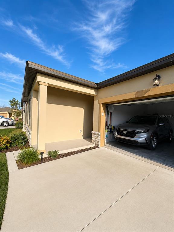 5882 Herder Road St. Cloud, FL 34771 - Photo 12 of 14 a view of car garage