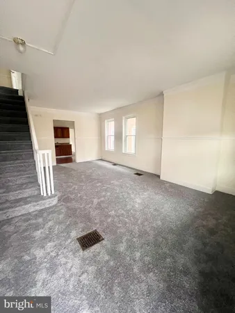 a view of livingroom with hardwood floor and window