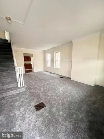 a view of livingroom with hardwood floor and window