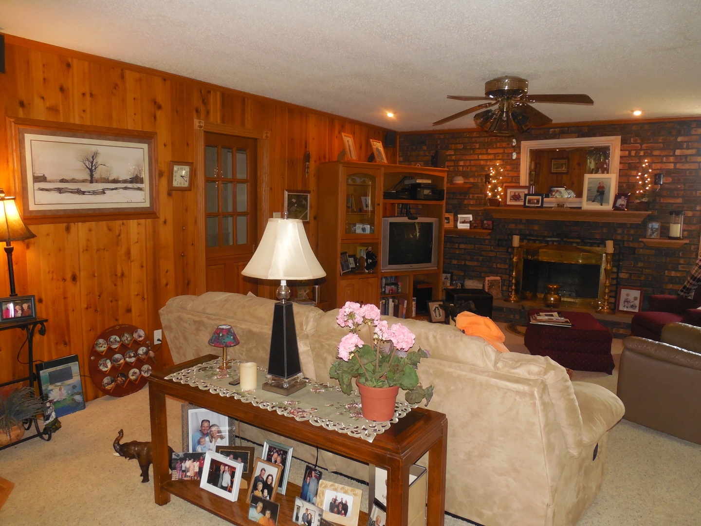12340 West Offner Road Manhattan, IL 60442 - Photo 11 of 38 a dining room with furniture and a chandelier