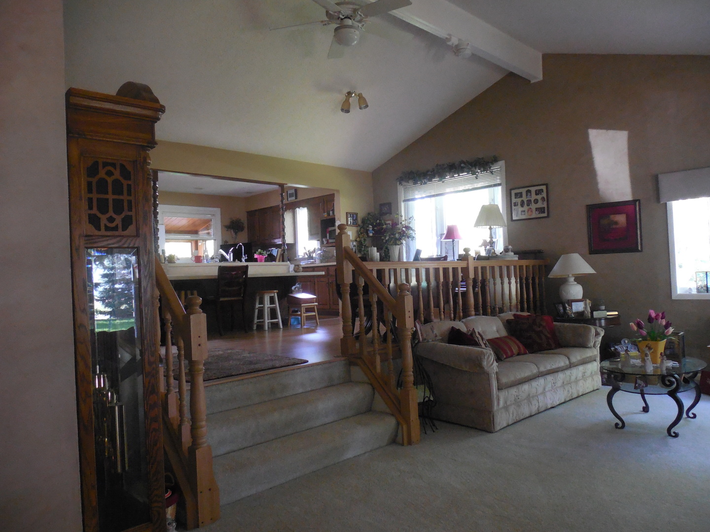 12340 West Offner Road Manhattan, IL 60442 - Photo 3 of 38 a living room with furniture and a chandelier