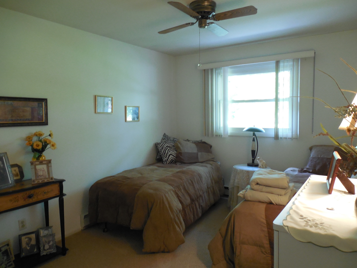 12340 West Offner Road Manhattan, IL 60442 - Photo 26 of 38 a bedroom with a bed and a window