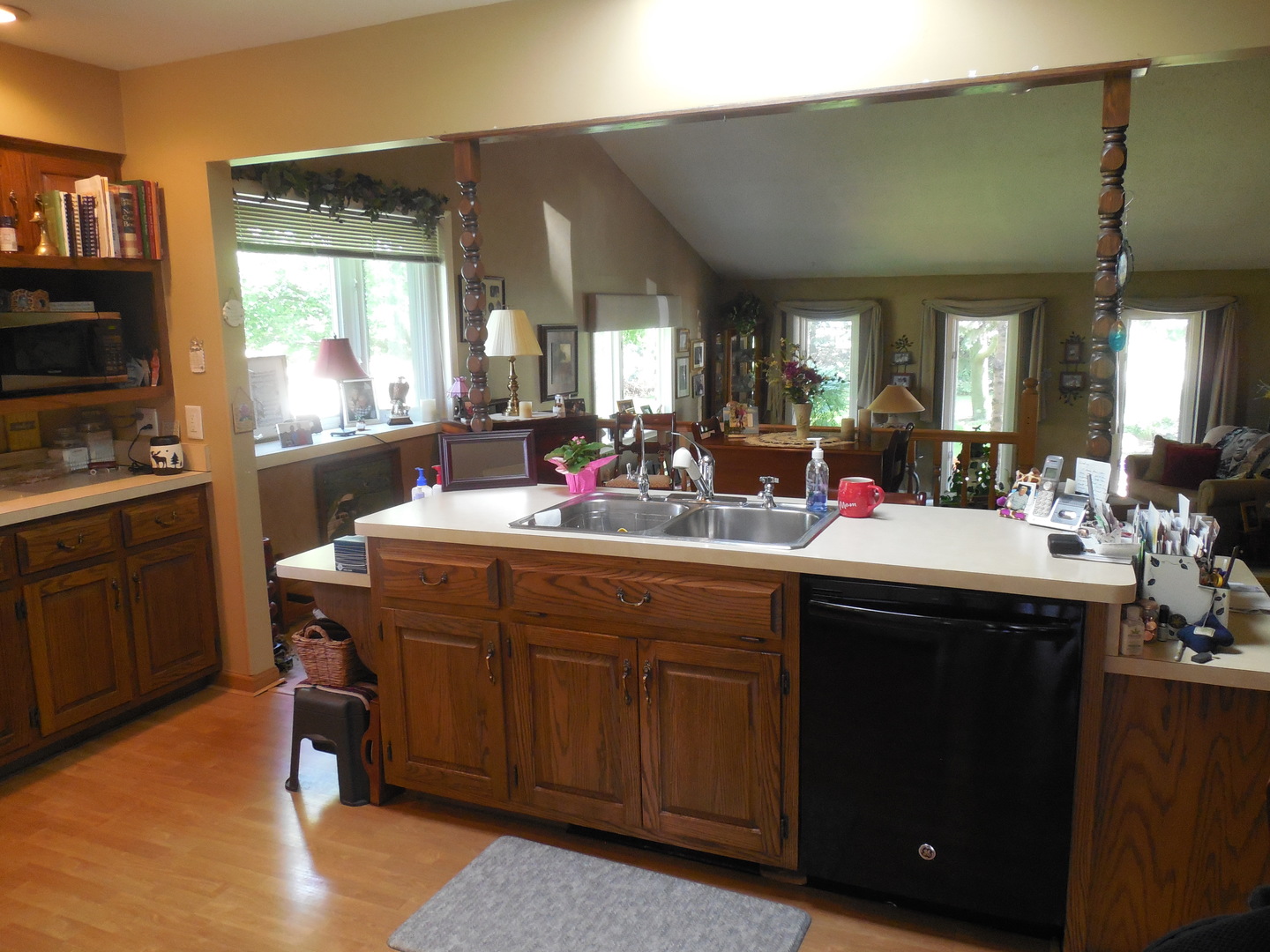 12340 West Offner Road Manhattan, IL 60442 - Photo 6 of 38 a kitchen with a sink cabinets and wooden floor