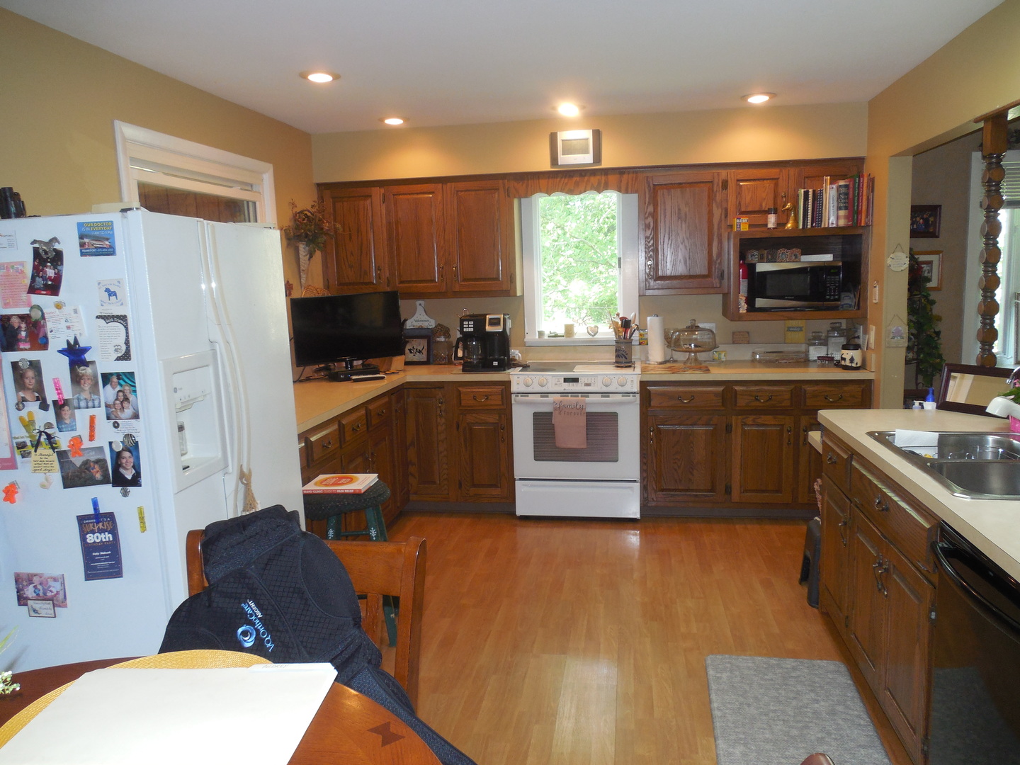 12340 West Offner Road Manhattan, IL 60442 - Photo 8 of 38 a kitchen with stainless steel appliances granite countertop a sink stove and refrigerator