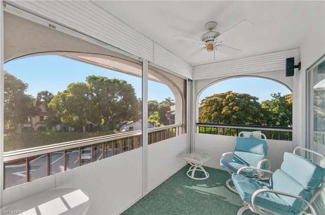 a view of a porch with furniture