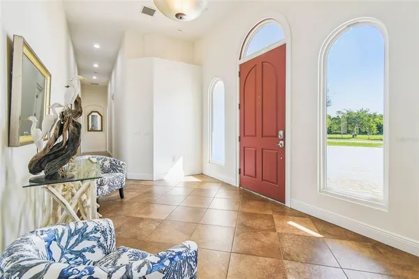 a view of a livingroom with furniture and window