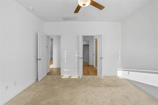 a stove top oven sitting inside of a kitchen