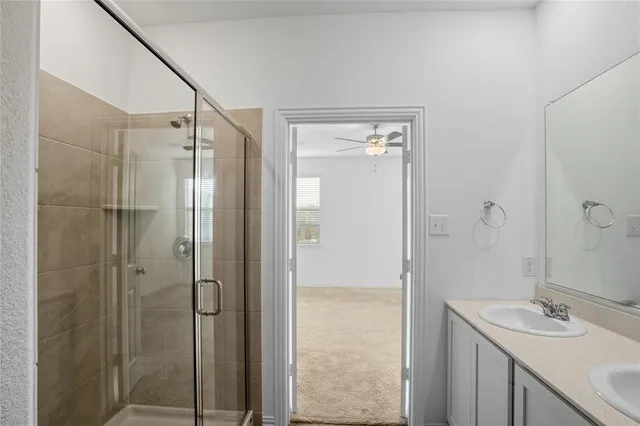 a kitchen with granite countertop a stove and a microwave