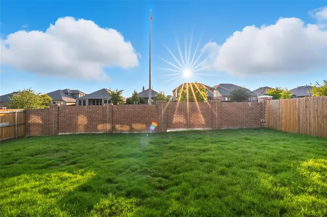 a view of a room that has a window in it