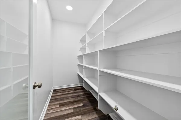 a view of an empty walk in closet