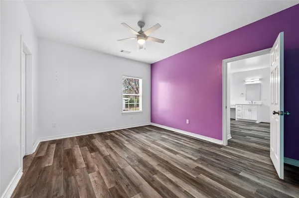 a view of a livingroom with wooden floor