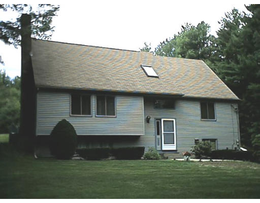 450 Sterling Road Holden, MA 01522 - Photo 1 of 6 a view of a house with a yard