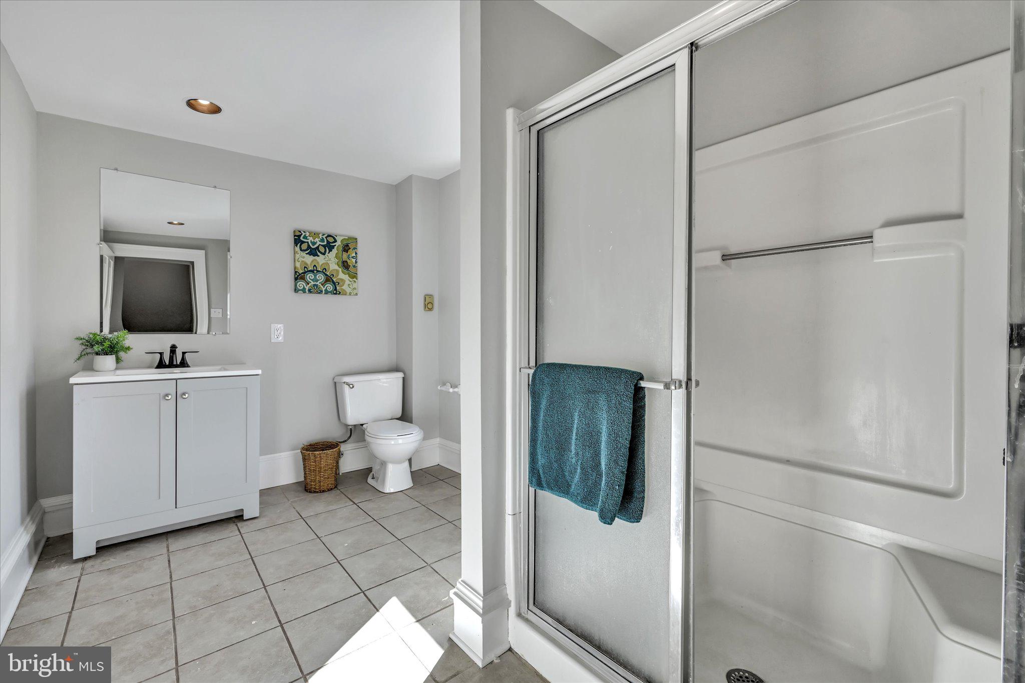 102 Landenberg Road Landenberg, PA 19350 - Photo 53 of 62 a bathroom with a toilet sink and mirror