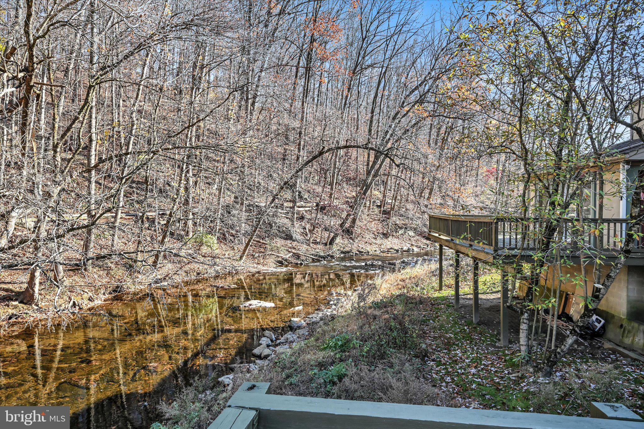 102 Landenberg Road Landenberg, PA 19350 - Photo 58 of 62 a backyard of a house with table and chairs