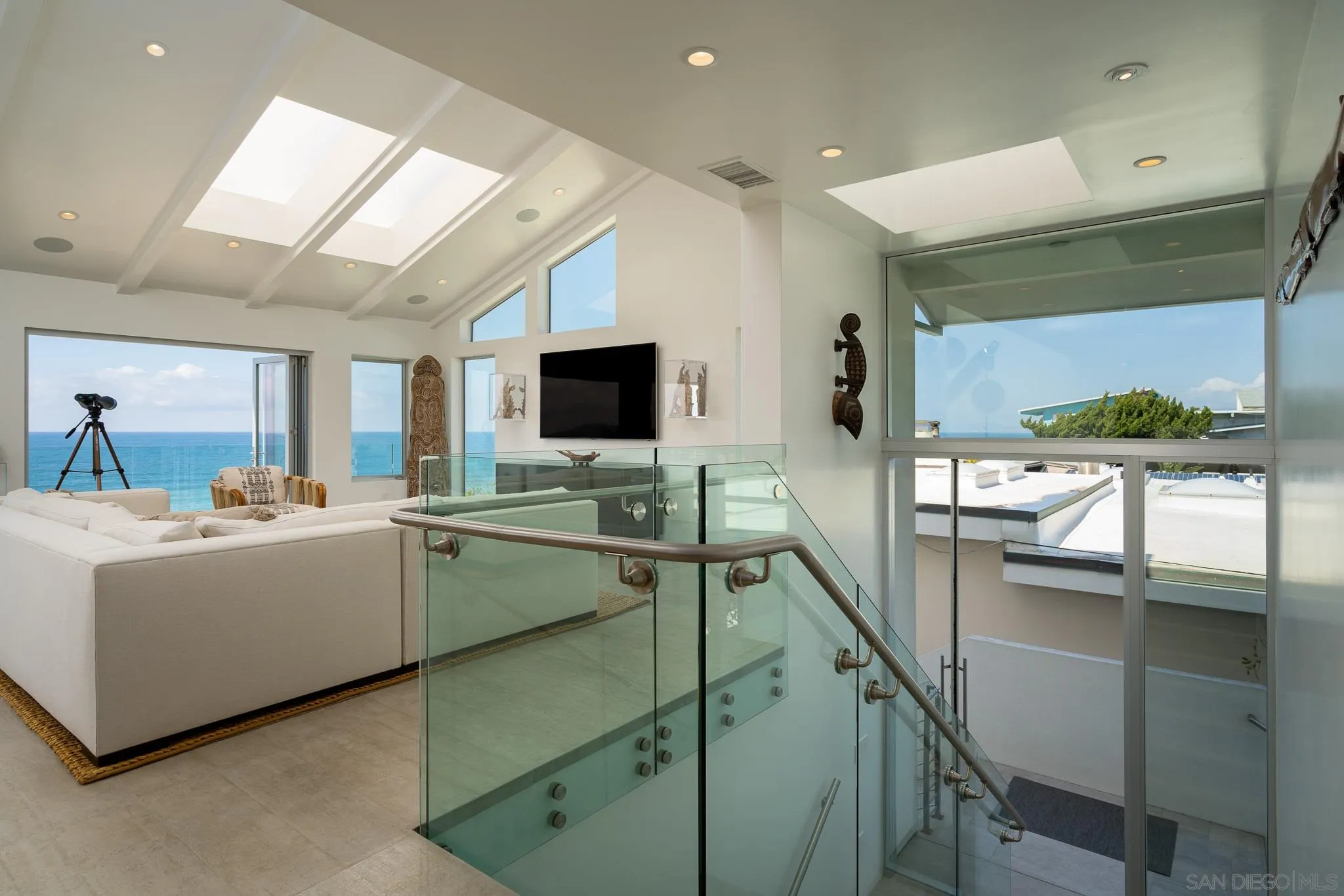 700 Neptune Avenue Encinitas, CA 92024 - Photo 15 of 36 a view of living room and kitchen
