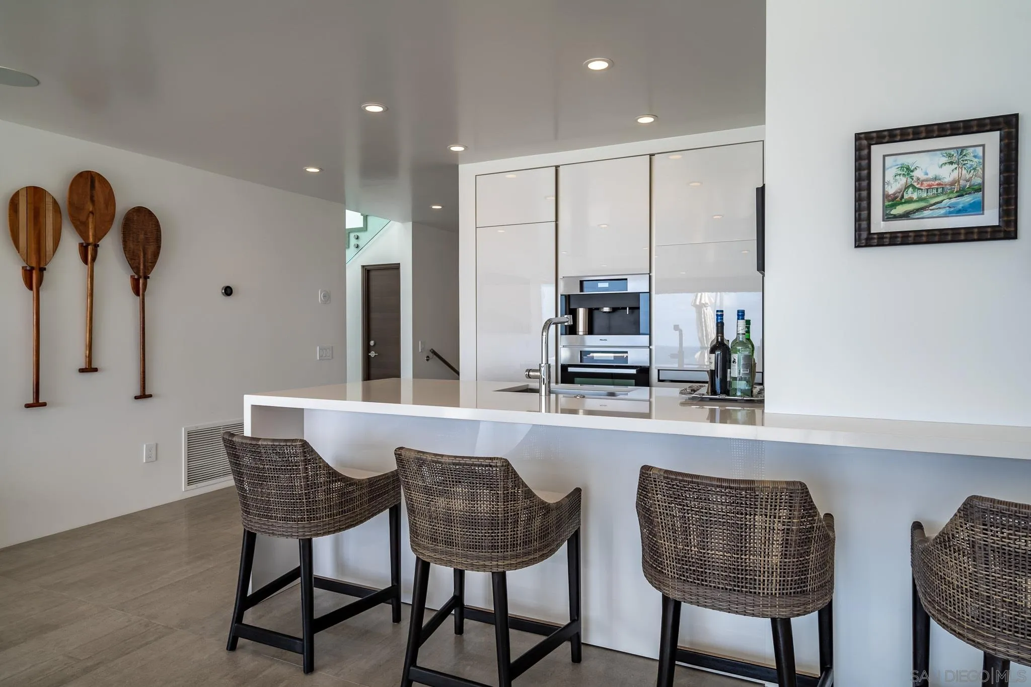 700 Neptune Avenue Encinitas, CA 92024 - Photo 22 of 36 a dining room with furniture and window