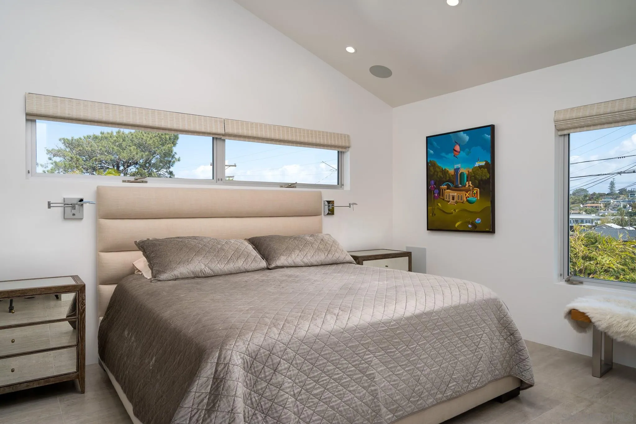 700 Neptune Avenue Encinitas, CA 92024 - Photo 10 of 36 a bedroom with a bed and window