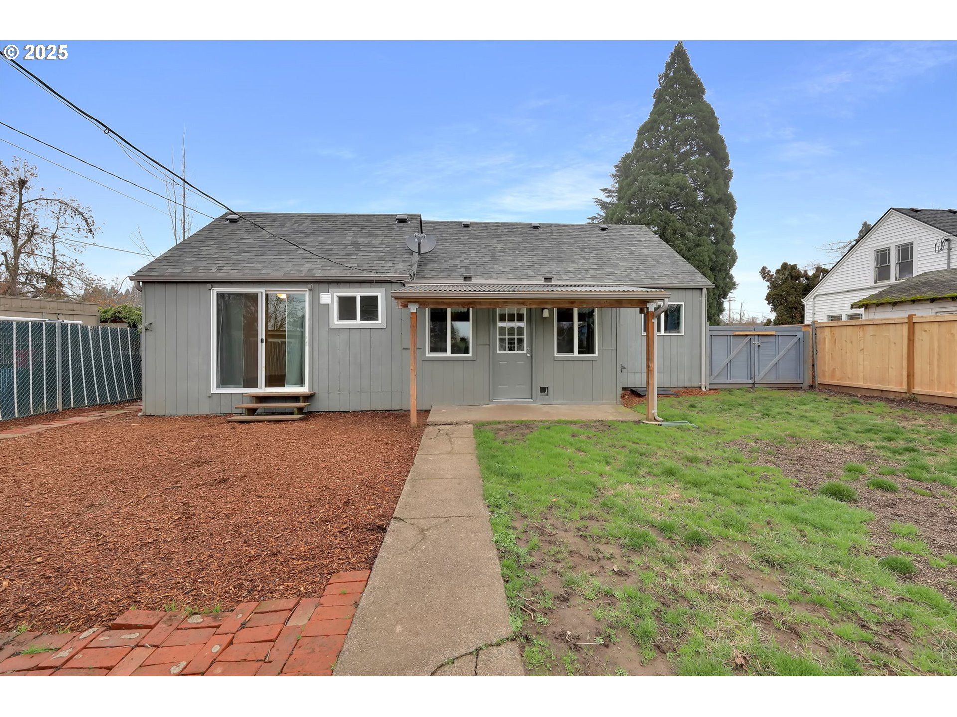 1349 E Street Springfield, OR 97477 - Photo 29 of 35 a view of a house with a backyard