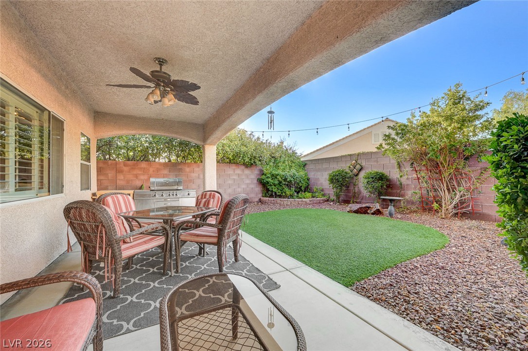 1604 Cattle Ranch Place Henderson, NV 89002 - Photo 63 of 99 A private covered patio provides a perfect outdoor dining area for entertaining guests.