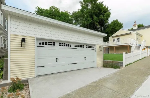 a view of a house with a garage
