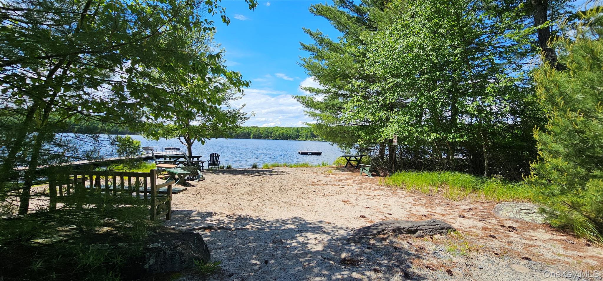 Lot 20.22 Woods Road Barryville, NY 12719 - Photo 19 of 20 a backyard of a house with a yard and outdoor seating