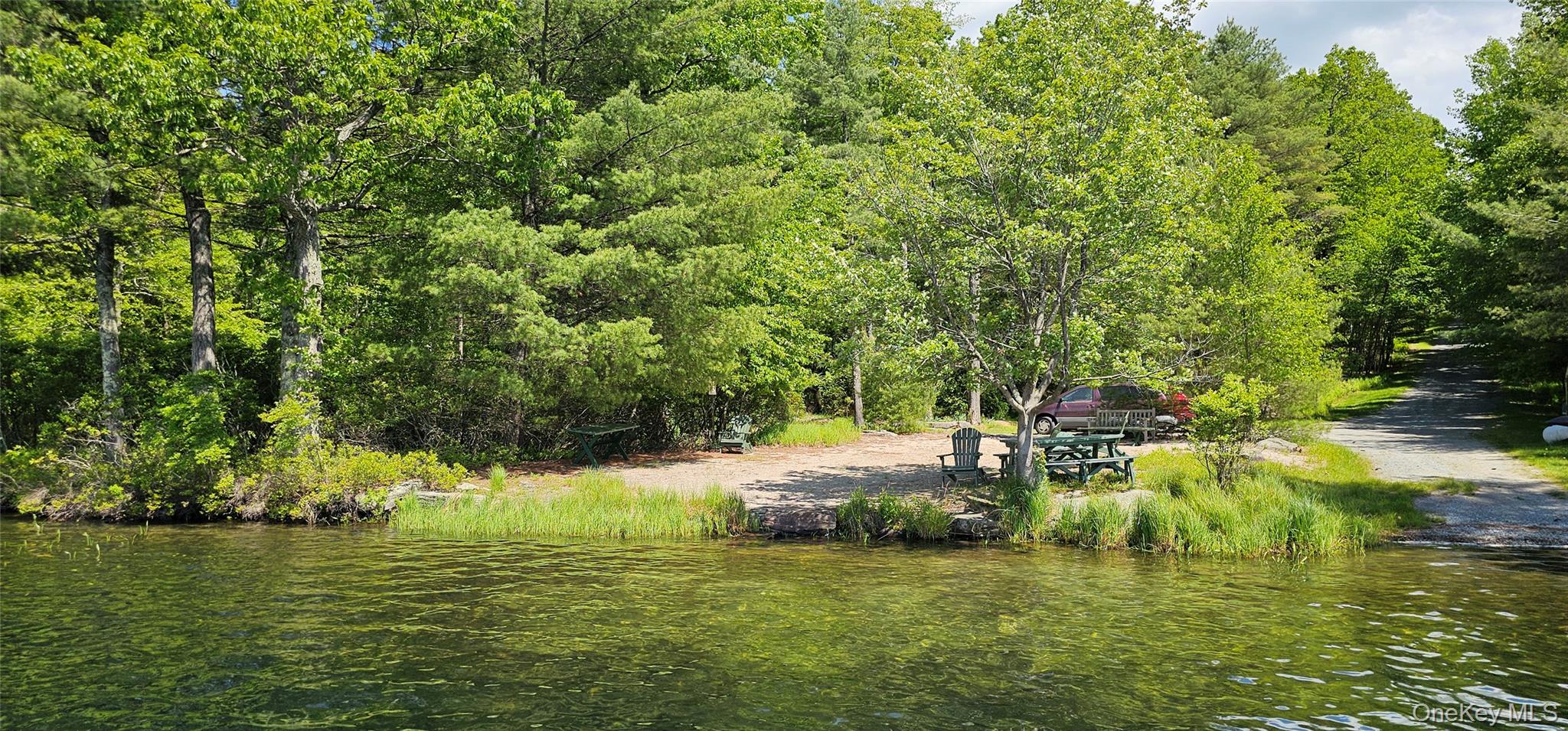 Lot 20.22 Woods Road Barryville, NY 12719 - Photo 3 of 20 a view of a lake with houses