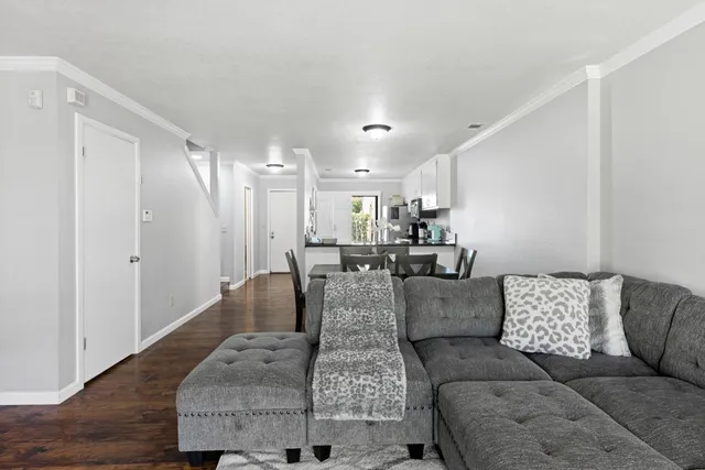 a living room with furniture and a couch