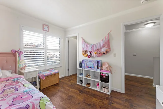 a bedroom with furniture and a bed