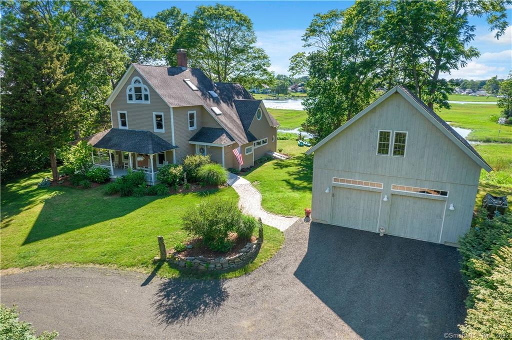 Welcome to 51 and 49 Waterside Lane in Clinton. If you like privacy, spectacular water views, and a walk to town, beach and marina, you've found your ideal home!