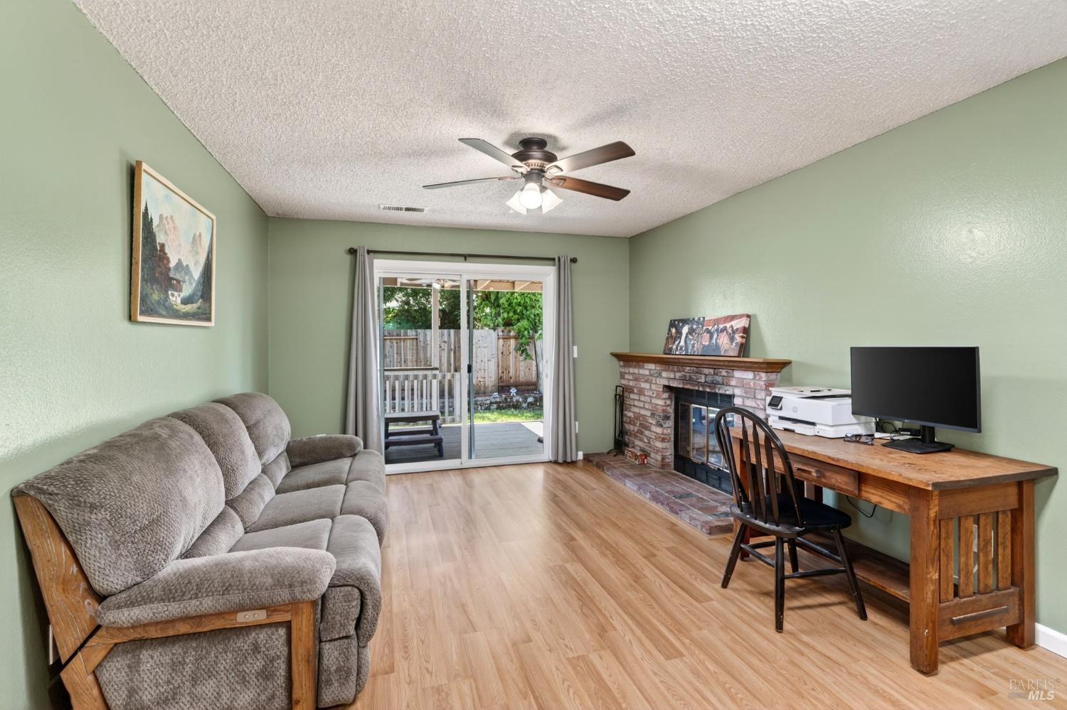 4526 Hillview Court Rohnert Park, CA 94928 - Photo 11 of 28 a view of a livingroom with workspace and a window